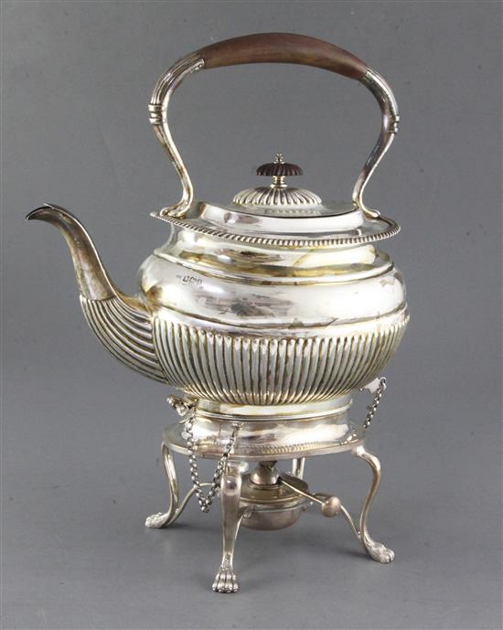 A late Victorian demi-fluted silver tea kettle on stand, with burner, Henry Howson, gross 48.5 oz